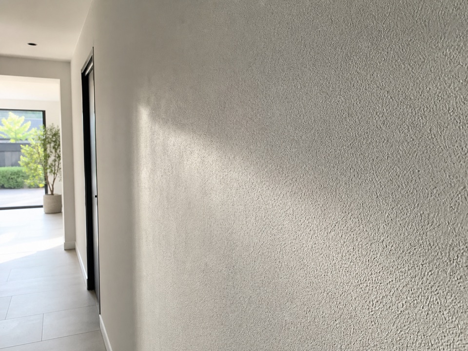 Gegenereerde portfoliofoto van een spachtelputz structuurwand